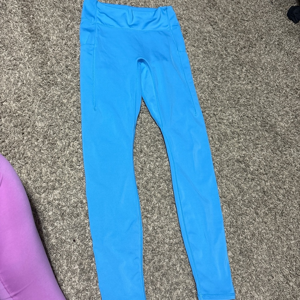 Blue Fabletics leggings. Lightly worn, good condition. I have too many leggings!